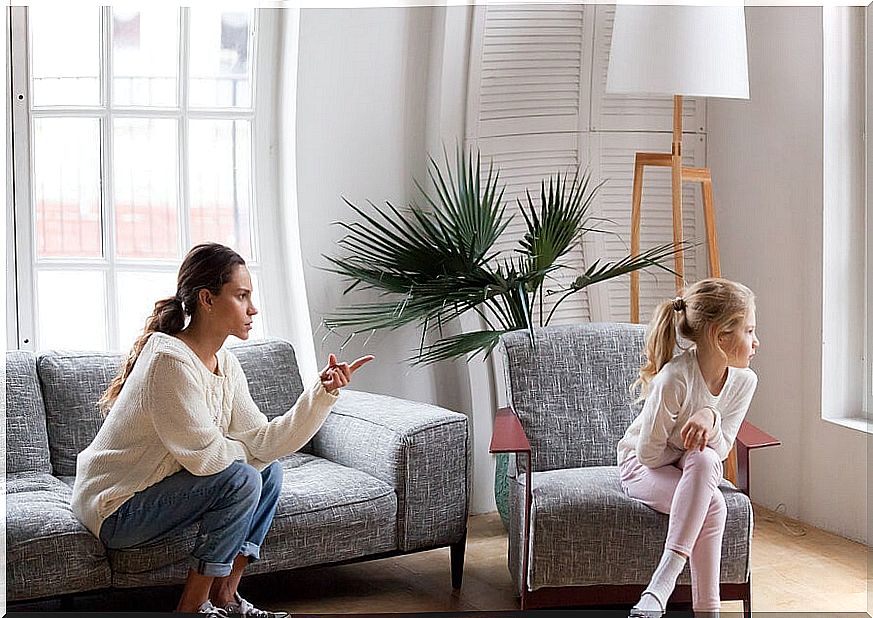 Mother trying not to yell at her daughter to scold her.