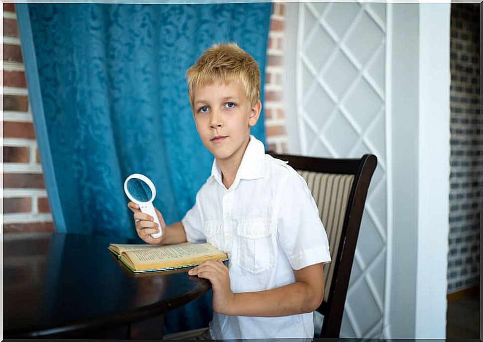 Child with a magnifying glass as the protagonists of children's books about detectives.