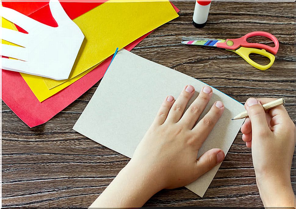 Child doing one of the crafts to celebrate Father's Day.