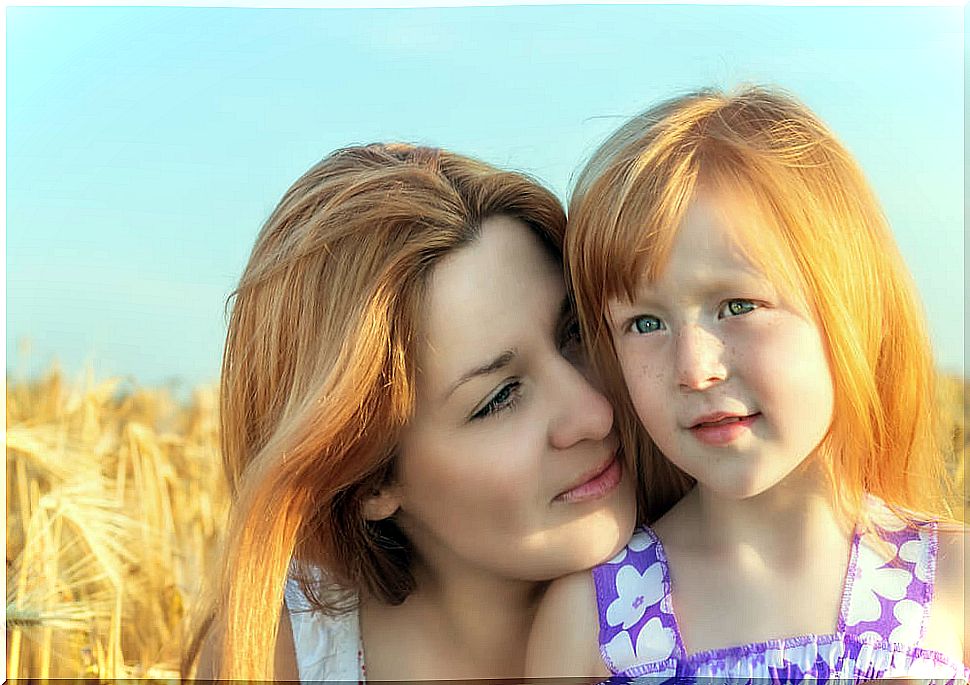 Mother hugging her highly sensitive daughter.