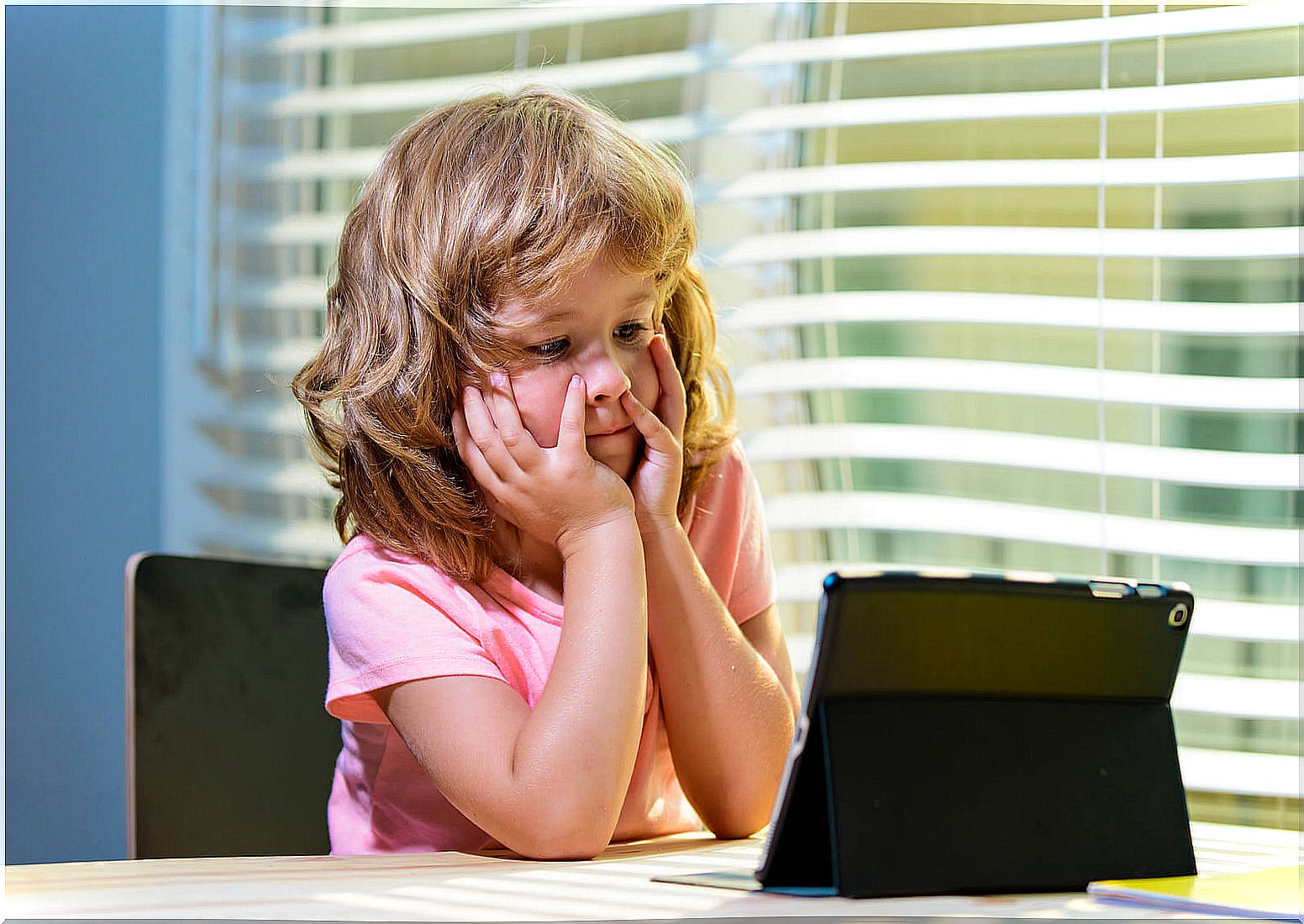 Girl frustrated while studying because she is afraid of exams.