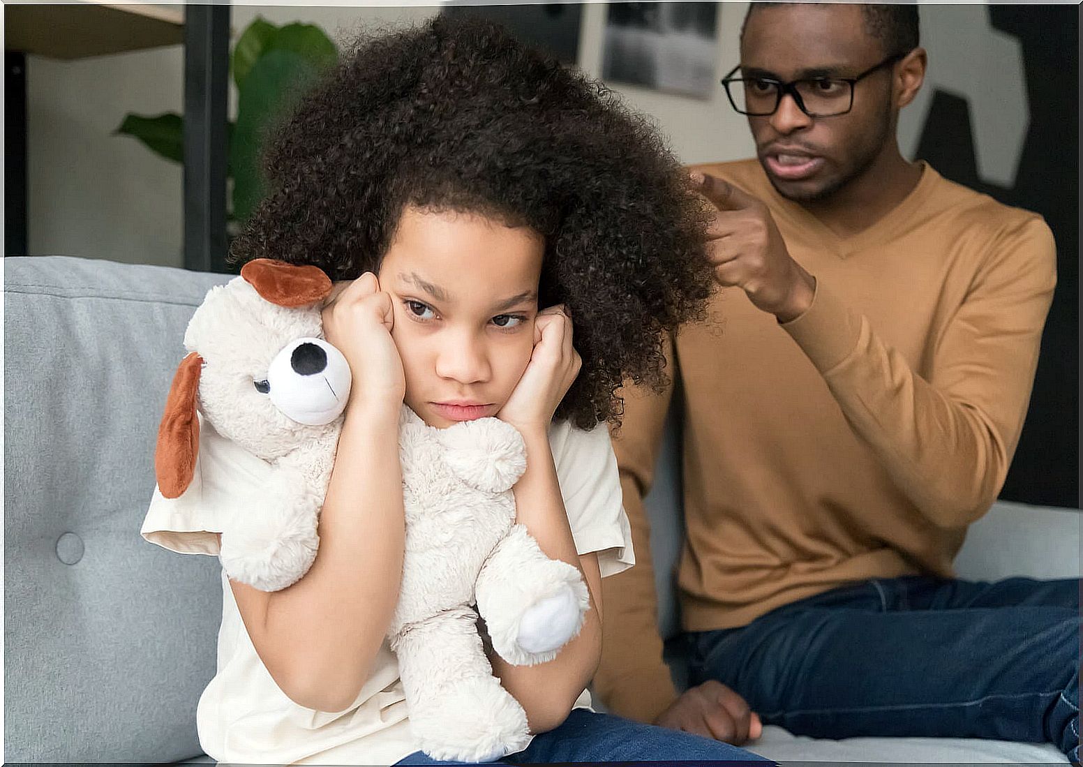 Father scolding his daughter trying to change parenting style.