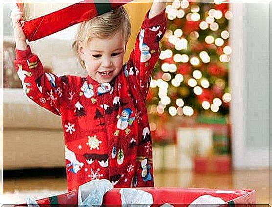 Boy opening a Christmas gift