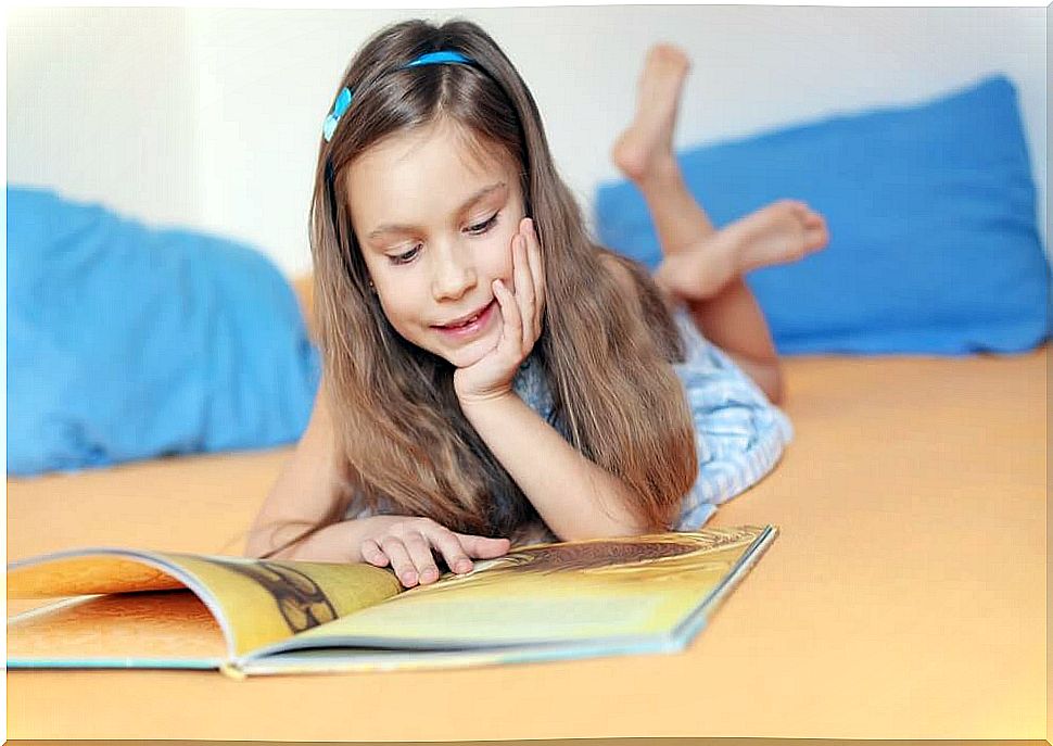 Girl reading in bed The Great Books of Superpowers.