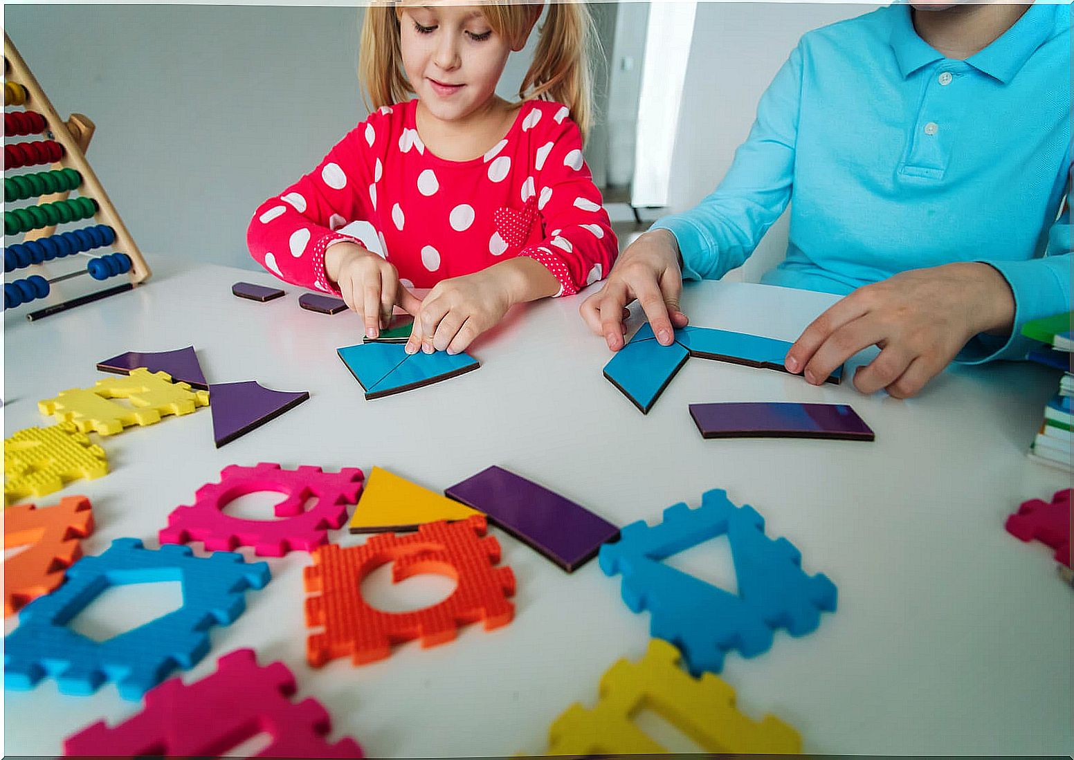 Children learning math by playing.