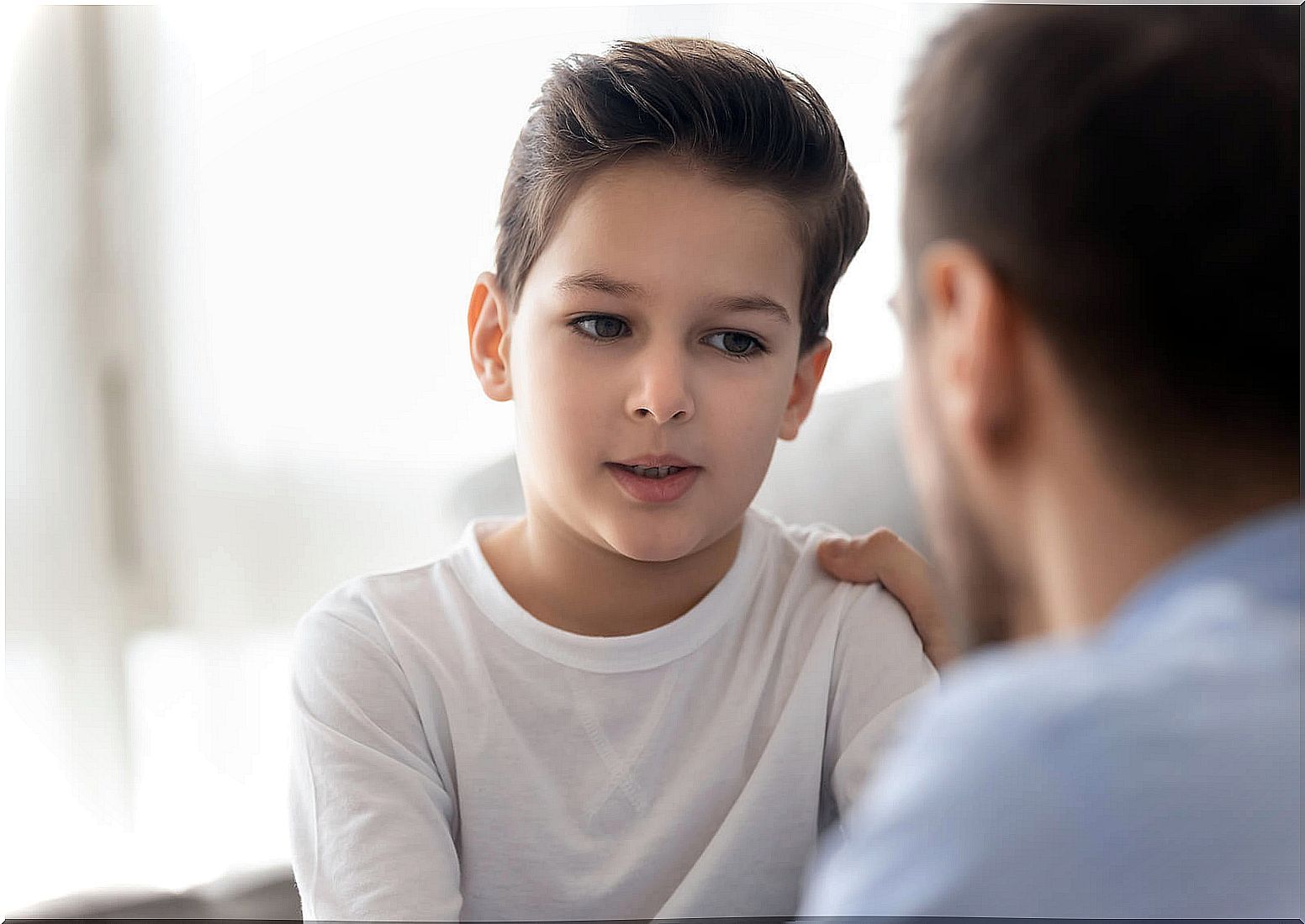 Father talking to his son to encourage awareness.